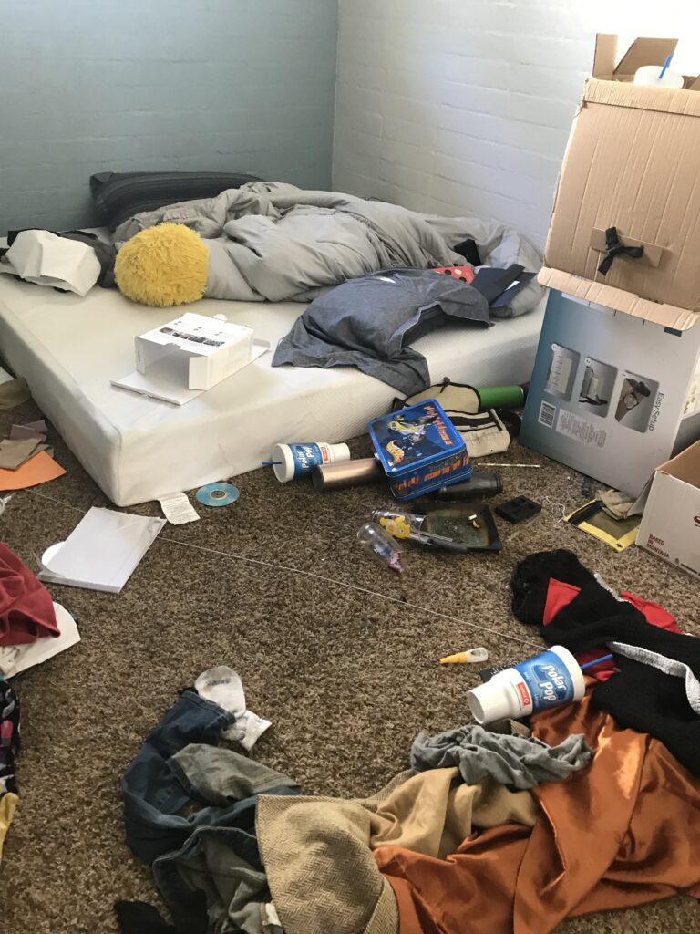 cluttered and messy bedroom